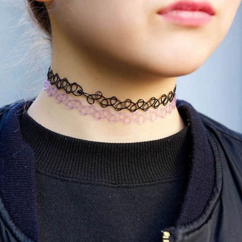 Neck Chain Tattoo On Girl Neck